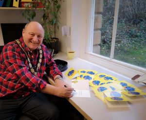 Mayor of Frome signing Christmas cards