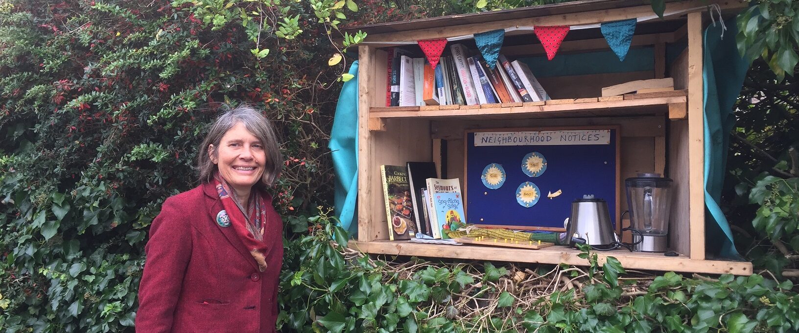 Photo of lady next to the Nunney Road share box