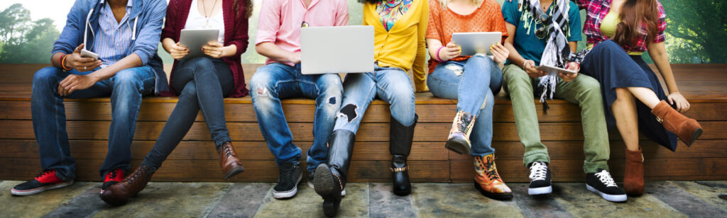 Teenagers sitting in a row