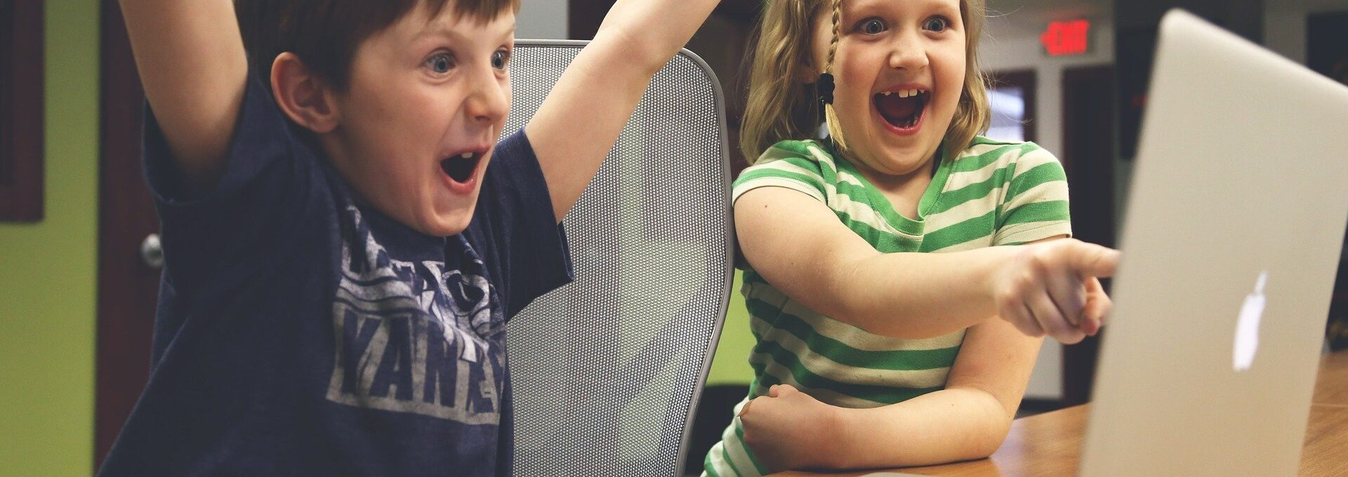 Children looking at a laptop