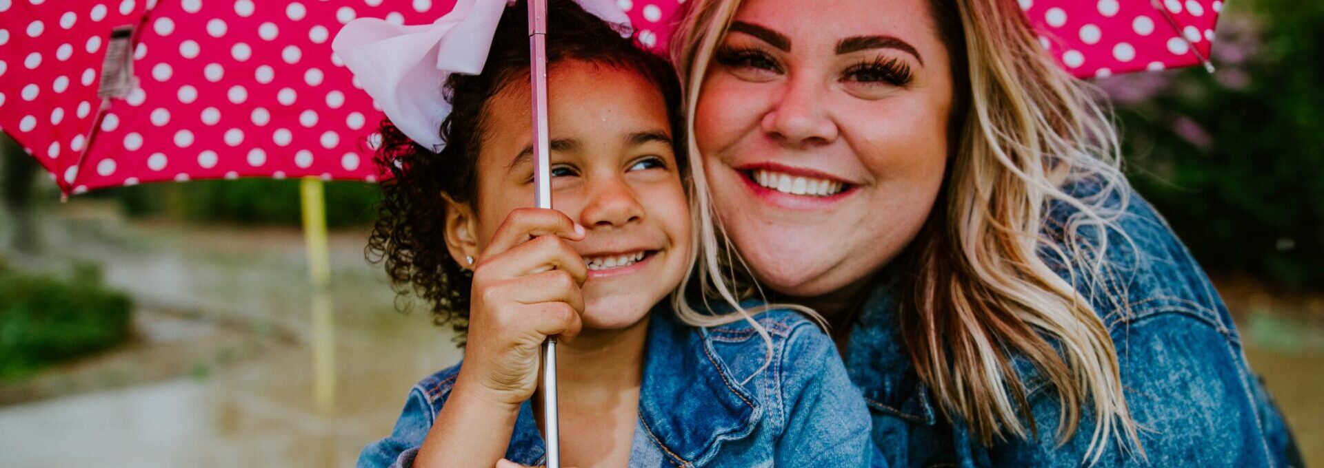 mother and child under umbrella