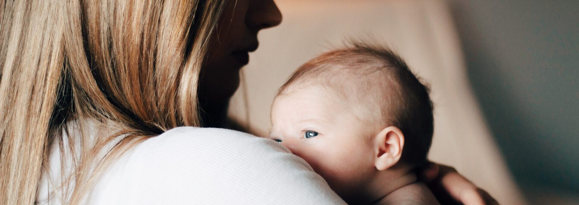 Mother holding newborn