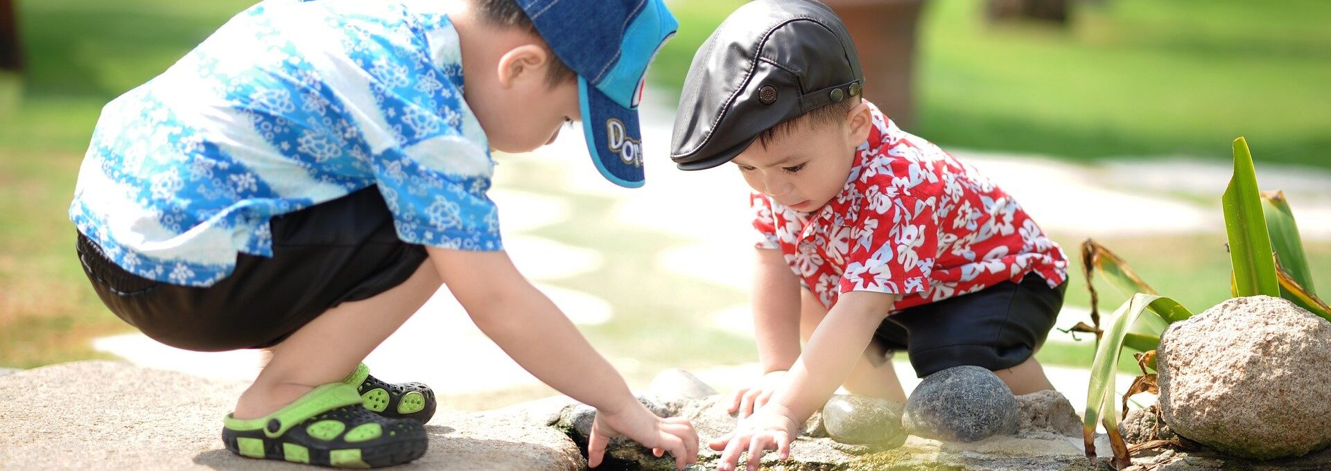 Two small children looking at water