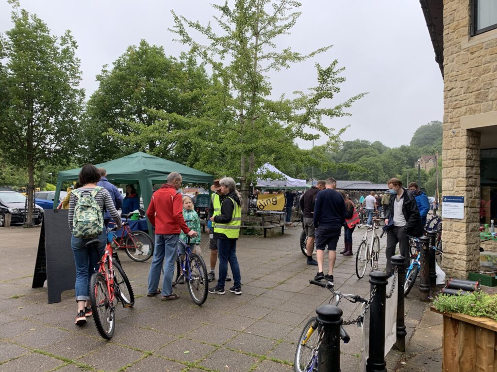 People and their bikes at the Bike Jumble