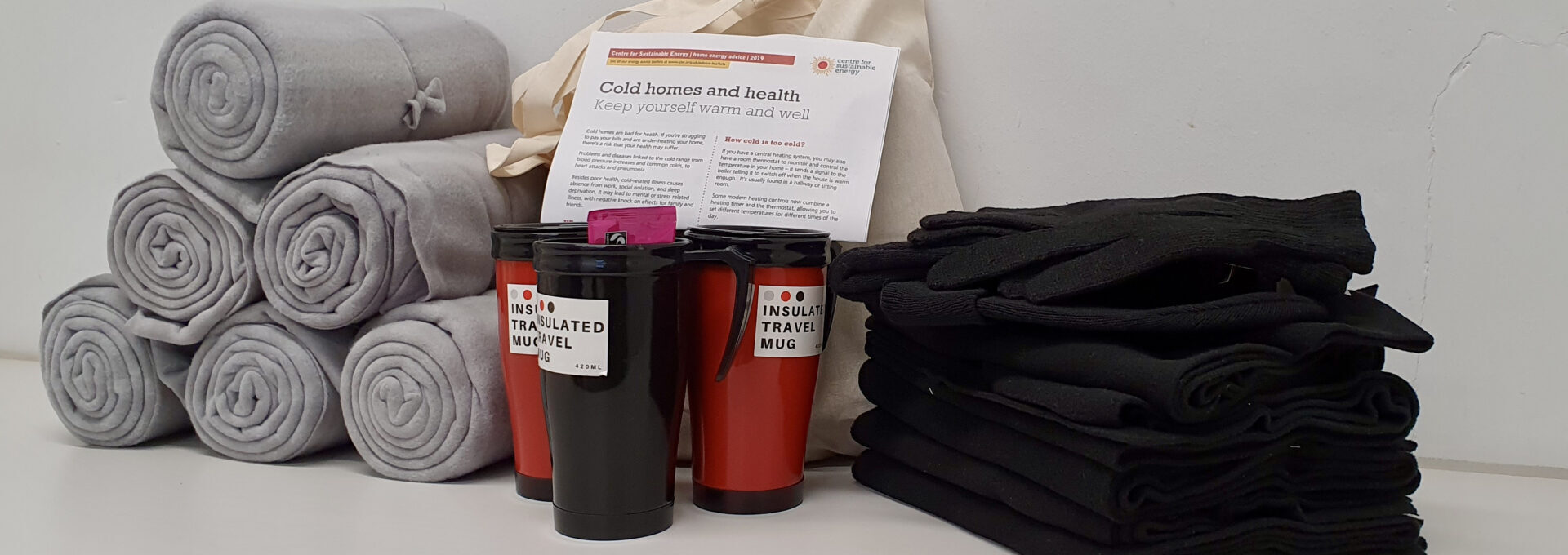 Winter warmth packs including blankets, thermal gloves, scarfs, socks mugs