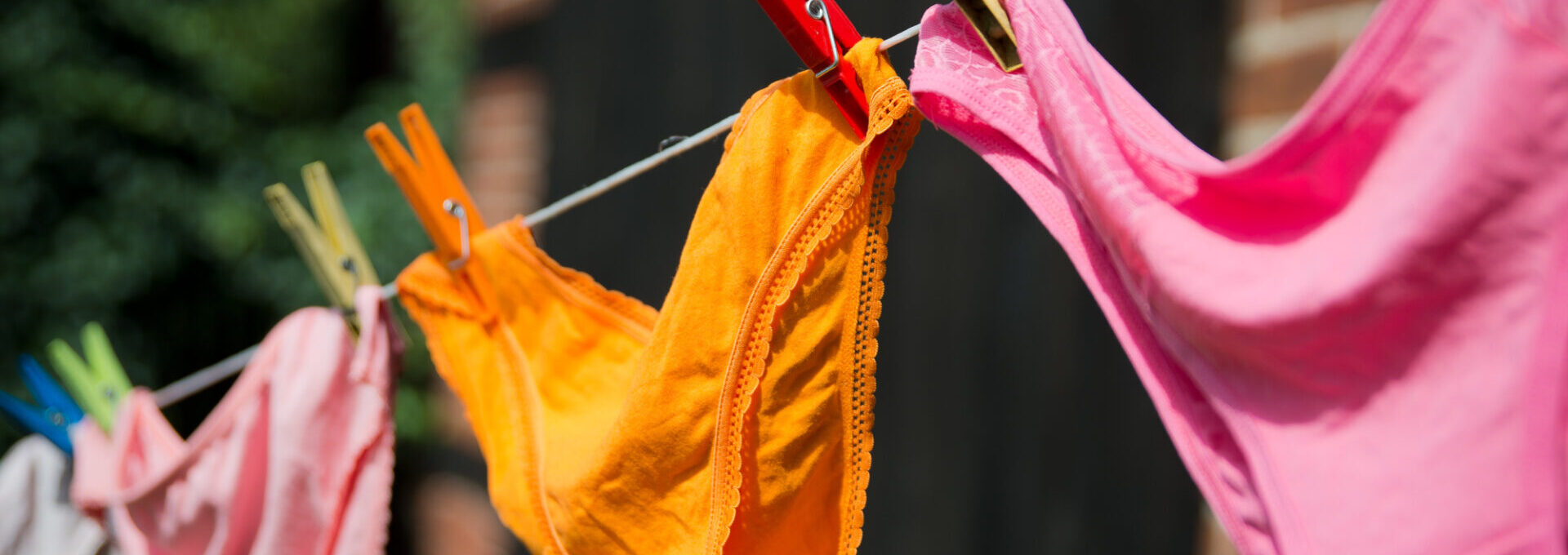 Underwear hanging on a string outside