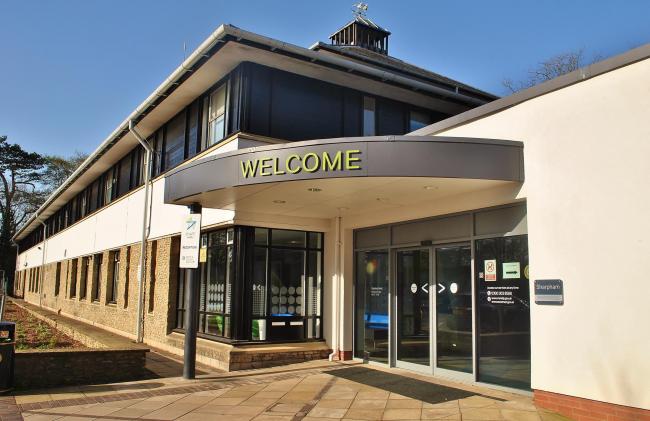 A large building with welcome on the entrance