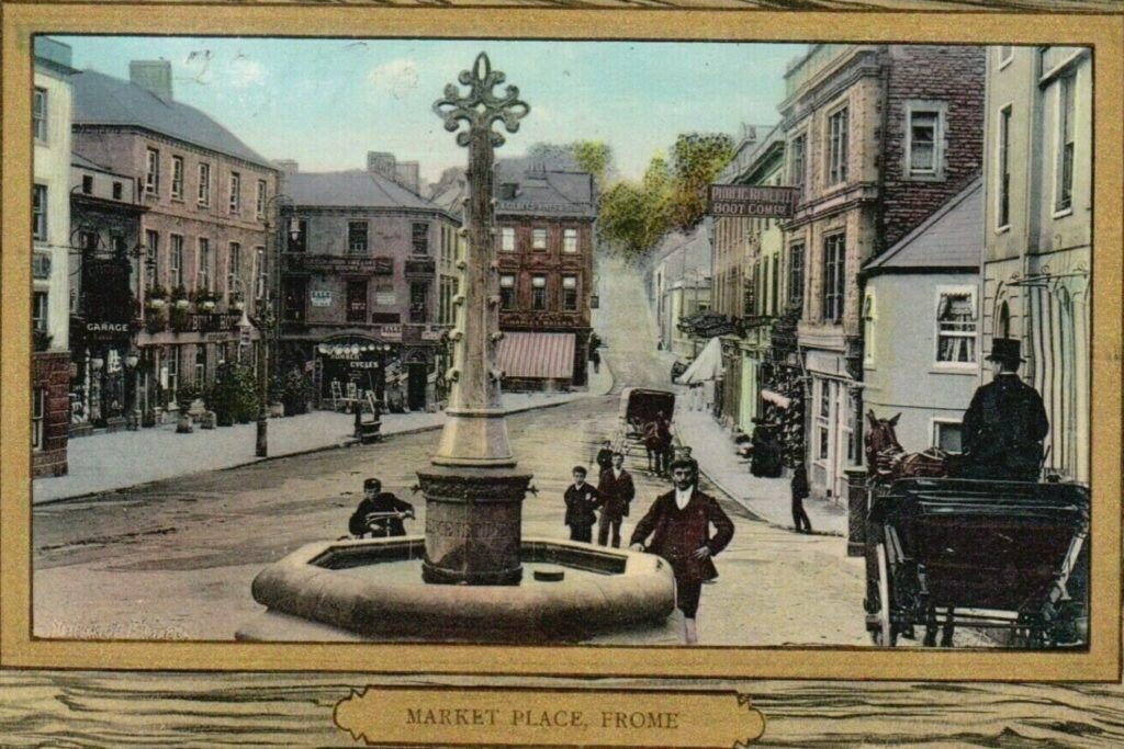 Old photograph of Frome, looking down on Market Place from above Boyle Cross. 