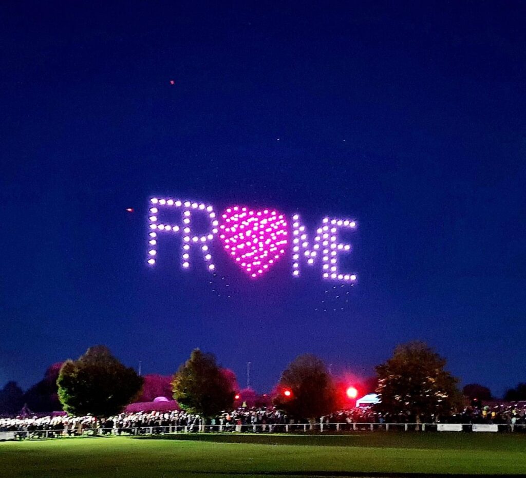 An image spelling Frome lit up in the night sky in drones 