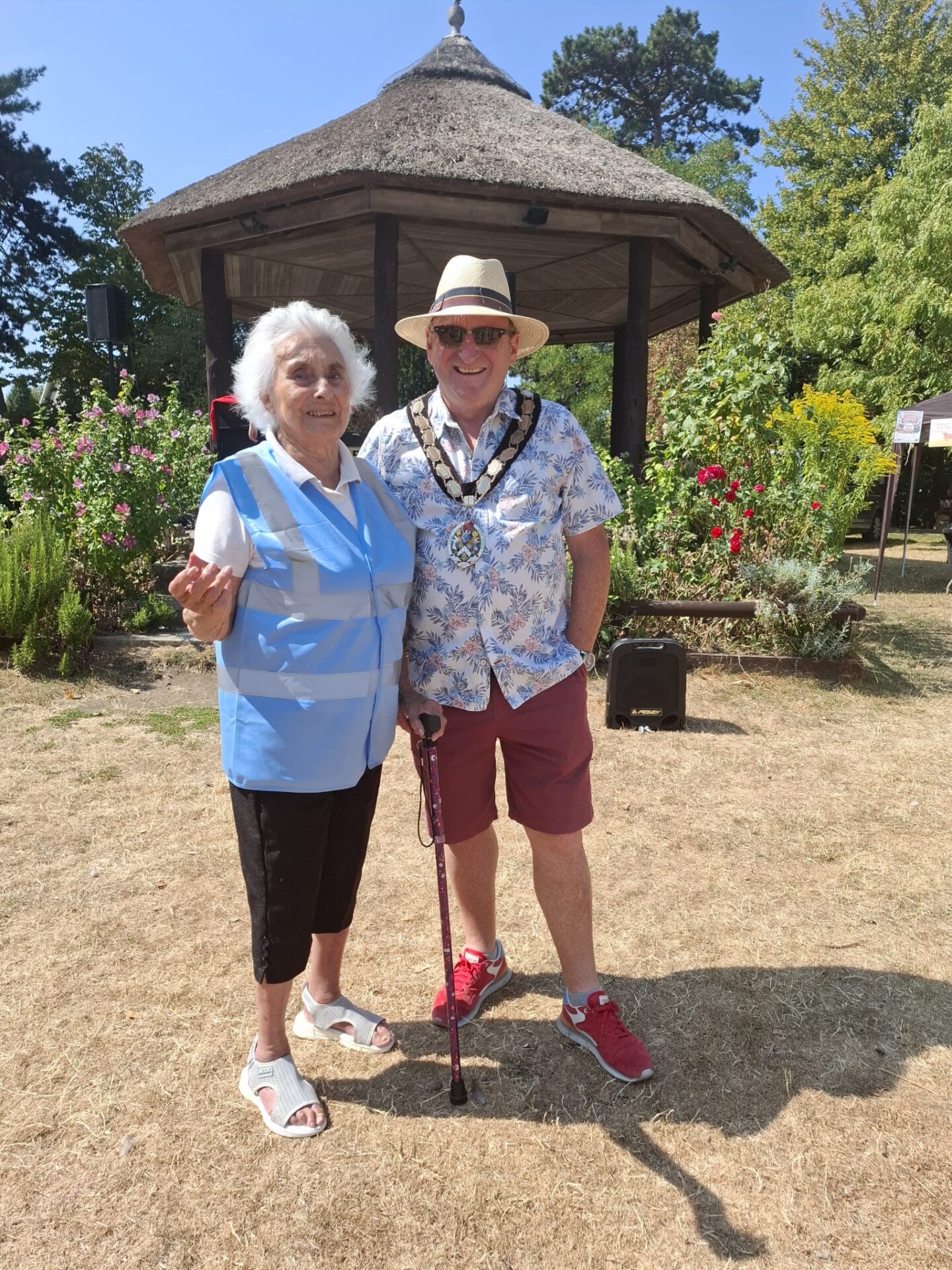 Mayor of Frome Mark Dorrington stands with June Barnes from Frome Carnival by teh Bandstand in Victoria Park