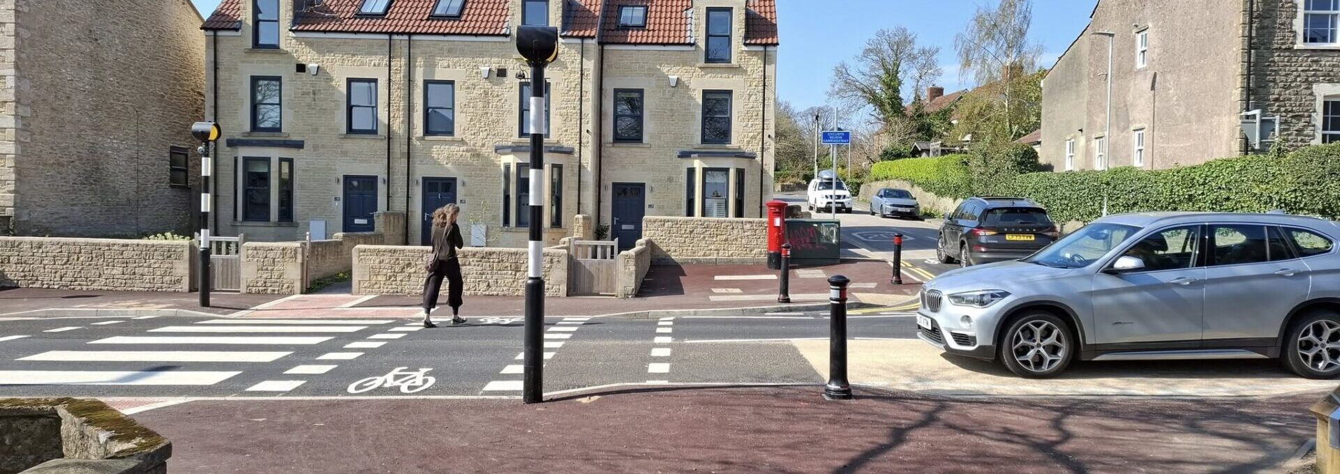 Butts crossing in Frome with pedestrians and car